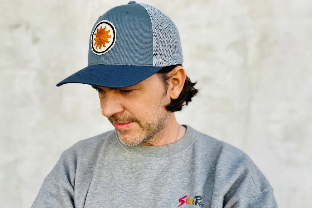 #223 - Basecap Trucker Cap Sun light-blue
